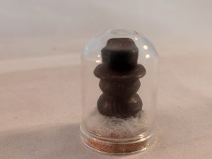 wenge snowman in a glass dome